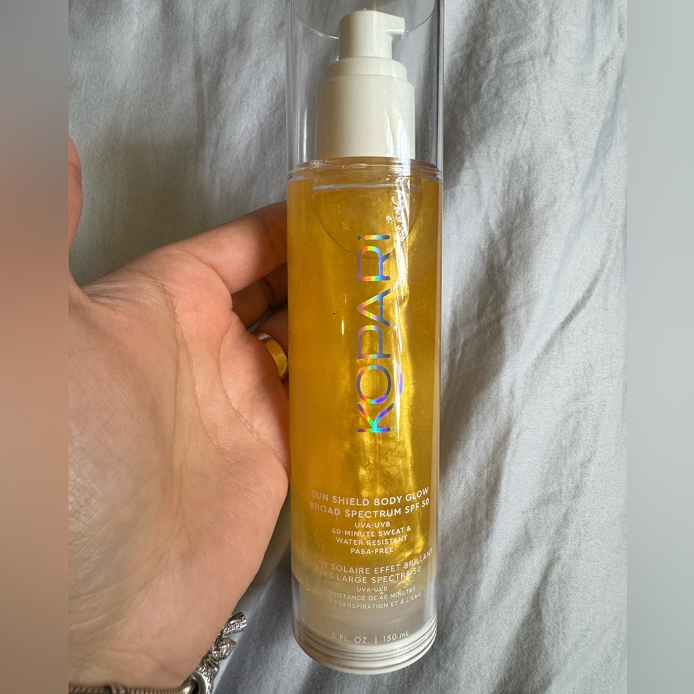 New , SUN SHIELD BODY GLOW, BROAD SPECTRUM SPF 50